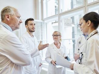 A group of doctors having a conversation