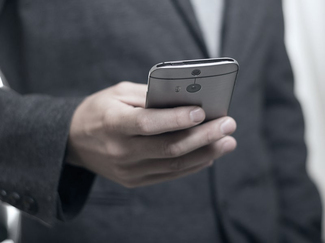 A smartphone held in the hand