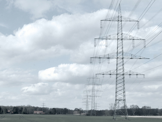 high-voltage power line on a field